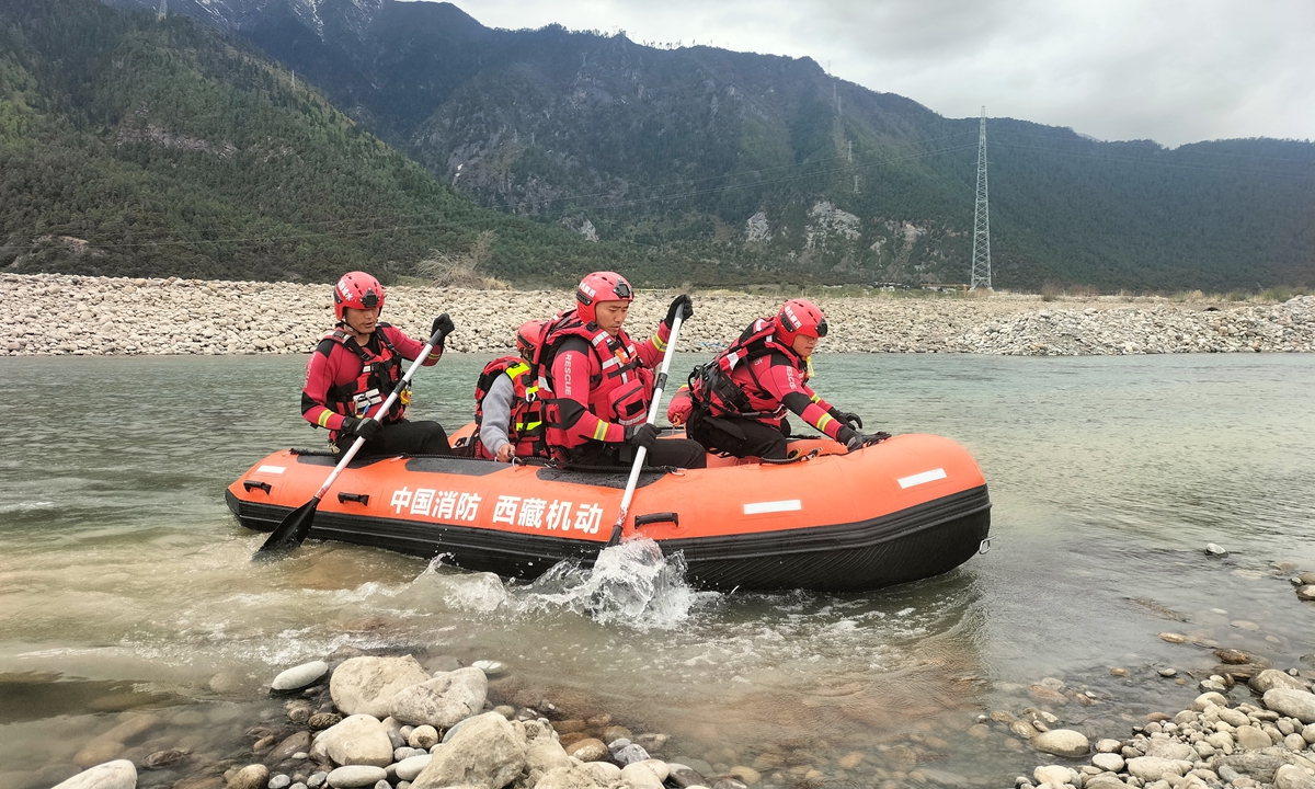An emergency drill simulating a flood exceeding design standards is held along the Niyang River in Nyingchi, Southwest China's Xizang Autonomous Region. Photo: Courtesy of Ma Chuanqiu