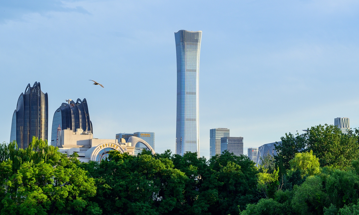 Beijing's city skyline Photos on this page: VCG  The golden tiles and sweeping upturned eaves with glazed mythical beasts at the Palace Museum in Beijing
