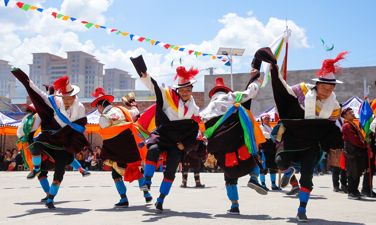 People dance to celebrate the Regong Festival in Tongren, Northwest China's Qinghai Province, on August 6, 2026. The large-scale annual religious festival, celebrated widely among the Tibetan and Tu ethnic minority communities in Tongren, is held during the sixth month of the Tibetan lunar calendar with sacrificial performances for the gods. Photo: VCG