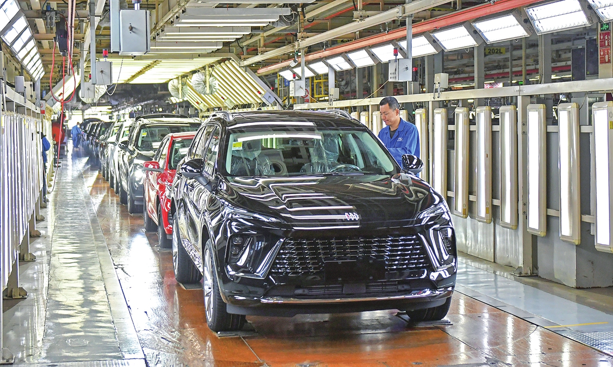 Employees work on the autmotive assembly production line at a SAIC-GM factory in Yantai, East China's Shandong Province, on April 16, 2026. Photo: VCG