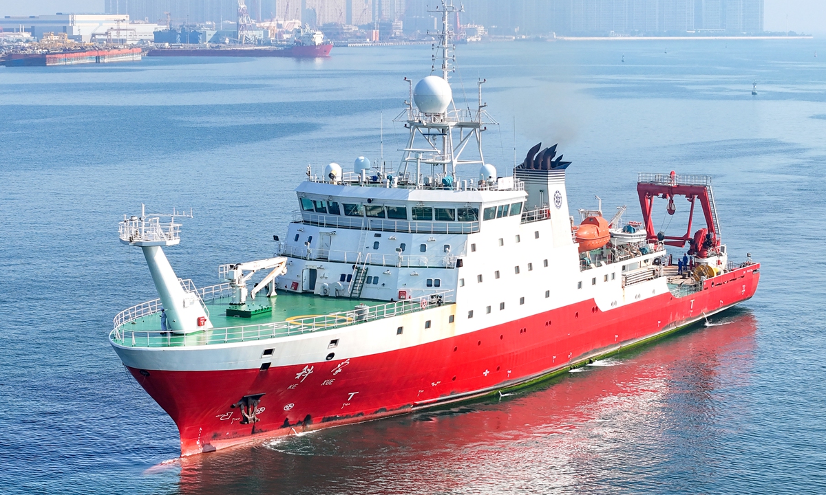 A drone photo taken on August 7, 2026 shows China's comprehensive research vessel Kexue entering a wharf base in Qingdao, East China's Shandong Province. Kexue docked at a wharf base of the Institute of Oceanology under the Chinese Academy of Sciences on Friday, marking the conclusion of a shared research cruise in the western Pacific after a 35-day voyage covering 5,845 nautical miles. Photo: VCG