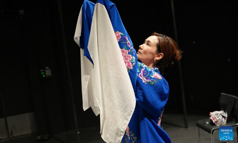 Chinese musical-theater actress Fiona Zhu rehearses for an original one-woman musical Herstory in History in London, Britain, Aug. 3, 2026. (Photo by Jade Cao/Xinhua)