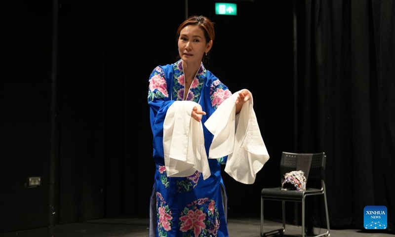 Chinese musical-theater actress Fiona Zhu rehearses for an original one-woman musical Herstory in History in London, Britain, Aug. 3, 2026. (Photo by Jade Cao/Xinhua)