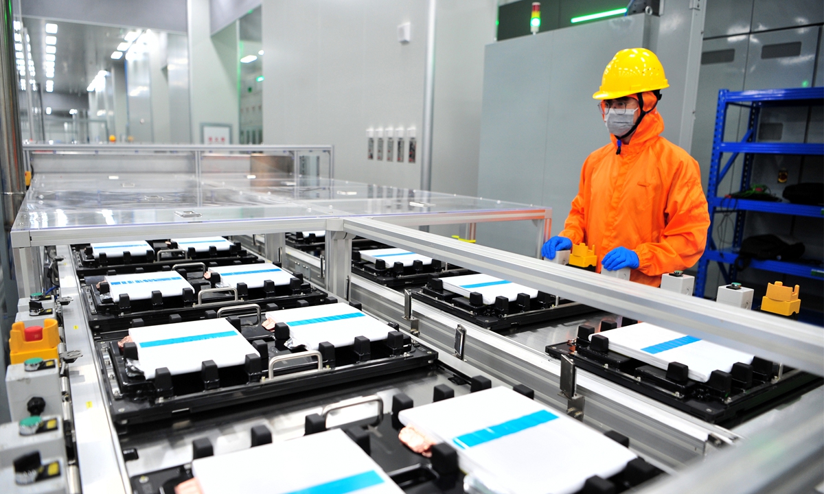 A worker monitors lithium battery cells on a production line at the newly commissioned second phase of CORNEX NEW ENERGY's 80-gigawatt hour battery industrial park in Yichang, Central China's Hubei Province, on August 9, 2026. The project, with a total investment of 22 billion yuan ($3.1 billion), is designed to produce more than 800,000 battery cells a day at full capacity. Photo: VCG