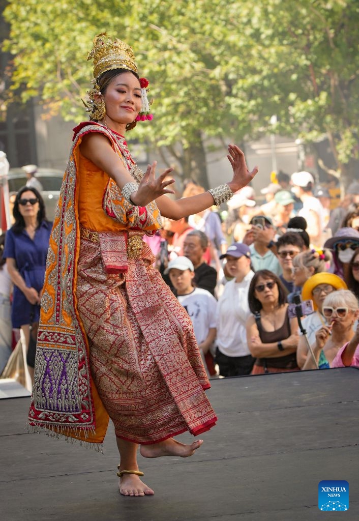 A performer presents traditional Thai dance during the 2026 Thai Festival in Vancouver, British Columbia, Canada, Aug. 8, 2026. The annual Thai Festival featured traditional food, music, dance, crafts and cultural performances, highlighting Thailand's rich and vibrant culture. (Photo by Liang Sen/Xinhua)