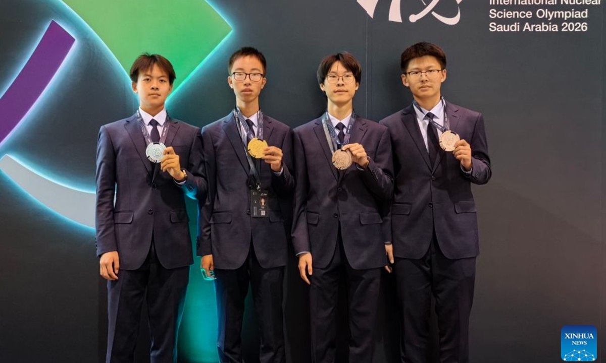 Four high school students from Beijing, China, who represented China at the third International Nuclear Science Olympiad (INSO) for the first time, pose for a group photo with their medals in Jeddah, Saudi Arabia, on August 8, 2026. Photo: Screenshot from the Xinhua News Agency