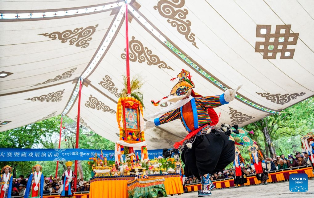 Artists stage a Tibetan opera during the Shoton Festival in Lhasa, southwest China's Xizang Autonomous Region, Aug. 15, 2026. Tibetan opera blends talking, singing, acting, dancing and literature, which is a must-see performance for visitors during the Shoton Festival. (Photo: Xinhua)