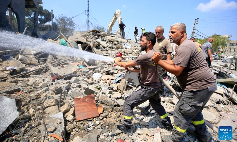 Firefighters put out a fire following Israeli airstrikes in Deir Al Zahrani, southern Lebanon, Aug. 15, 2026. Lebanese broadcaster Al-Jadeed TV reported that four people were killed and nine others wounded after an Israeli airstrike hit a two-story building in the town of Deir Al Zahrani in the Nabatieh District. (Photo: Xinhua)