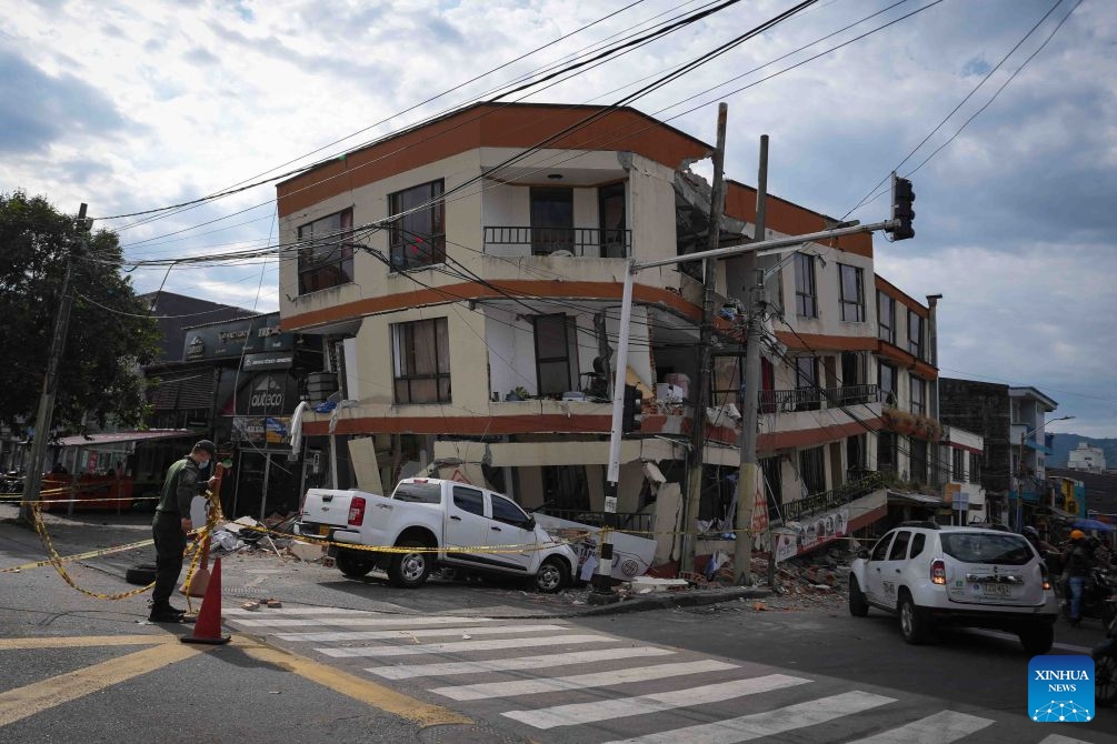 This photo taken on Aug. 14, 2026 shows vehicles and buildings damaged in an earthquake in Pereira, Colombia. A 7.4-magnitude earthquake jolted western Colombia on Monday. (Photo: Xinhua)