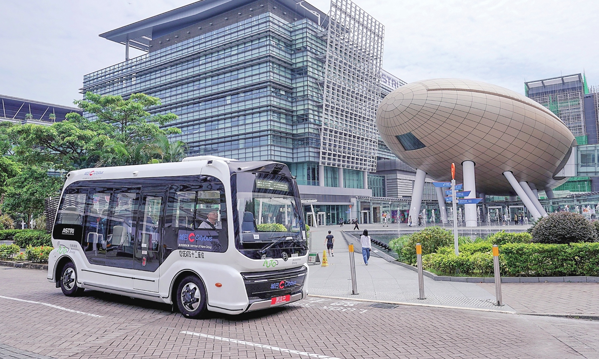 An autonomous minibus conducts road tests in a tech park in the Hong Kong Special Administrative Region on August 11, 2026. Introduced by Citybus, the autonomous vehicle recently secured a pilot license to run tests between the park and MTR University Station. Photo: VCG