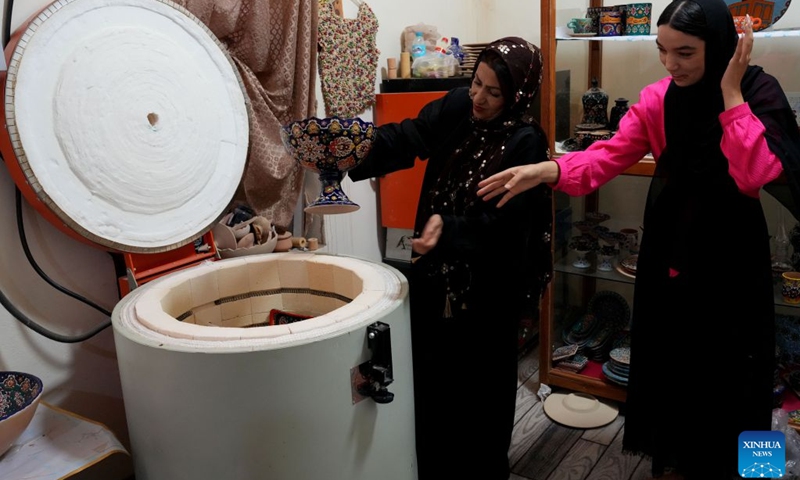 Women fire ceramic handicrafts at a workshop in Herat, Afghanistan, Aug. 9, 2026. (Photo: Xinhua)
