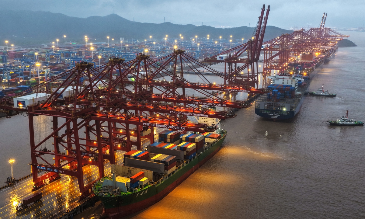 Vessels shuttle busily at Ningbo Zhoushan Port's Jintang Port area, East China's Zhejiang Province on the evening of August 11, 2026. The port has fully resumed operations following the subsiding impact of Typhoon Dolphin. Photo: VCG
