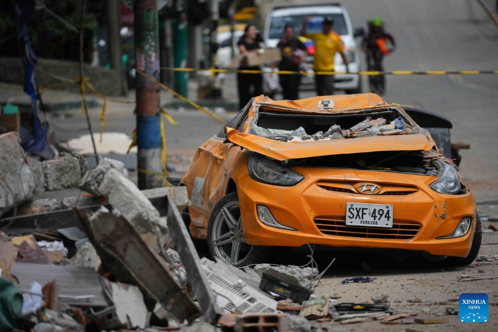 This photo taken on Aug. 14, 2026 shows a car damaged in an earthquake in Pereira, Colombia. A 7.4-magnitude earthquake jolted western Colombia on Monday. (Photo: Xinhua)
