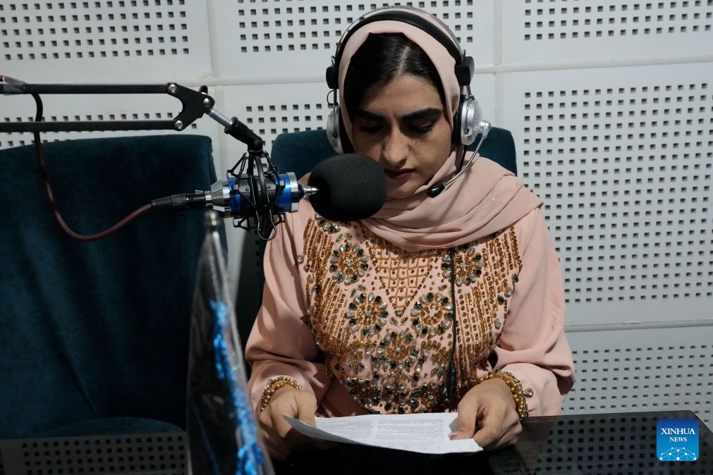 A woman works at a radio station in Herat, Afghanistan, Aug. 9, 2026. (Photo: Xinhua)