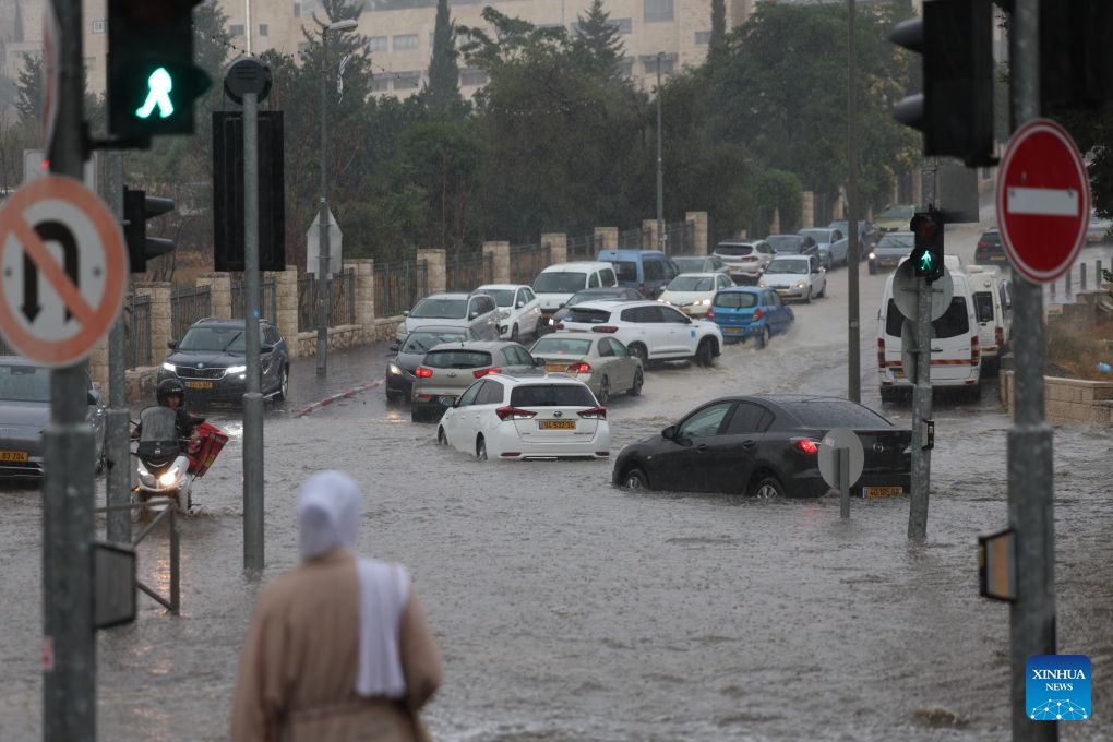 Photo taken on Aug. 15, 2026 shows a flooded road section in Jerusalem. Rare heavy downpours trigger mountain flash floods and urban waterlogging across Jerusalem on Saturday. The region is currently in midsummer, a period typically marked by extreme drought and almost zero precipitation. (Photo: Xinhua)