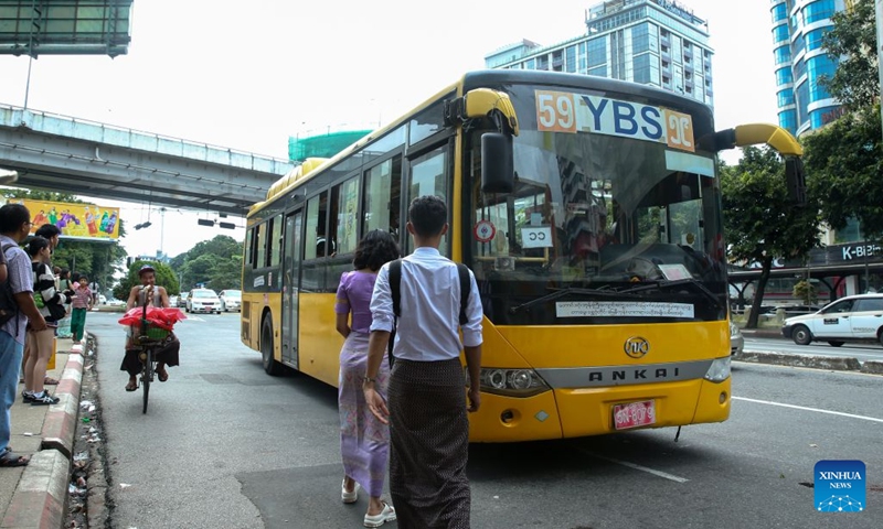 People get on a Yangon Bus Service (YBS) bus in Yangon, Myanmar, Aug. 15, 2026. Public bus fares on the Yangon Bus Service (YBS) routes, the main public bus network in Yangon, will increase from Sept. 1 to address rising costs of vehicle spare parts and maintenance, the state-owned daily The Global New Light of Myanmar reported Saturday. (Photo: Xinhua)