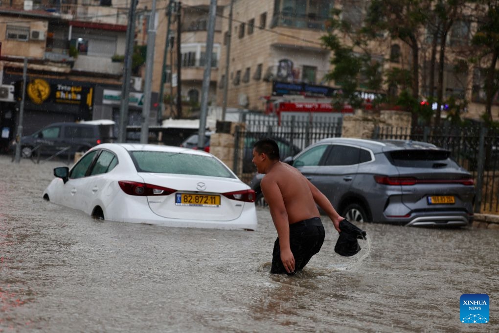 Photo taken on Aug. 15, 2026 shows a flooded road section in Jerusalem. Rare heavy downpours trigger mountain flash floods and urban waterlogging across Jerusalem on Saturday. The region is currently in midsummer, a period typically marked by extreme drought and almost zero precipitation. (Photo: Xinhua)