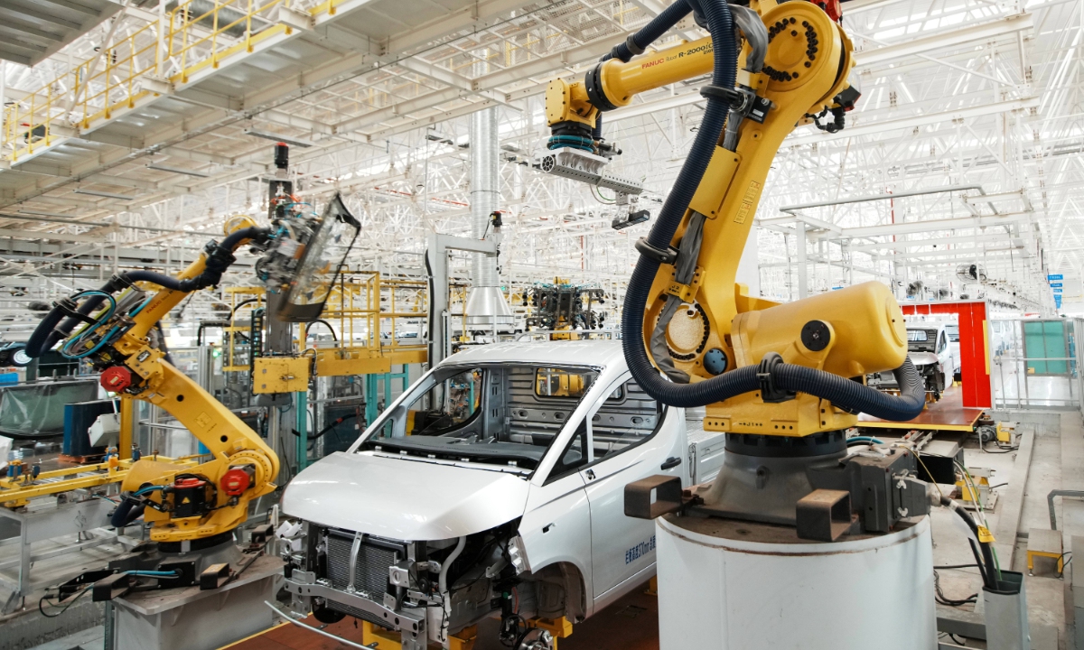 Robots assemble a new-energy passenger vehicle at Liuzhou Wuling Automobile Industry Co in Liuzhou, South China's Guangxi Zhuang Autonomous Region, on July 18, 2026. Photo: VCG