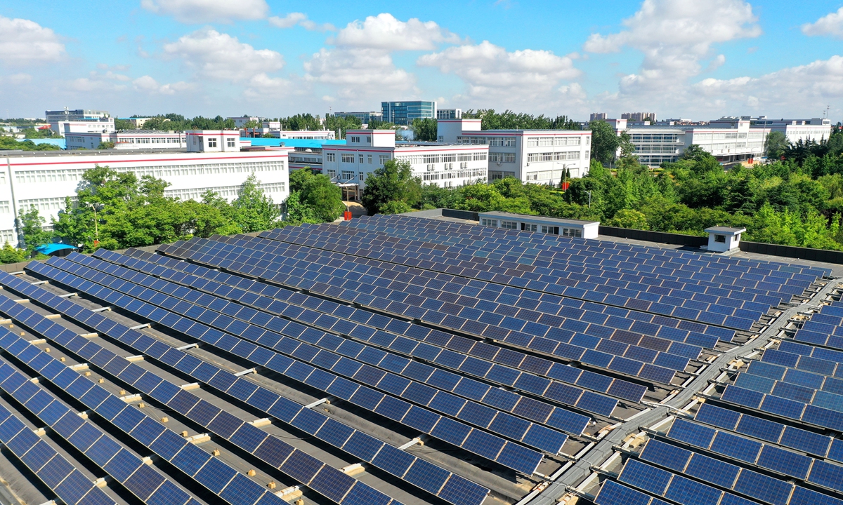 Solar rooftop photovoltaic power generation facilities are seen on a building in Qingdao, East China's Shandong Province, on June 23, 2026. Photo: VCG