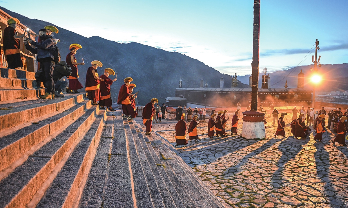 People attend the Buddha exhibition ceremony at a temple in Lhasa, Southwest China's Xizang Autonomous Region, on August 12, 2026. The day coincided with the 30th day of the sixth month in the Tibetan calendar, when Lhasa celebrates its annual Shoton Festival. The Shoton Festival was included in the first batch of China's national intangible cultural heritage list in 2006. Photo: VCG