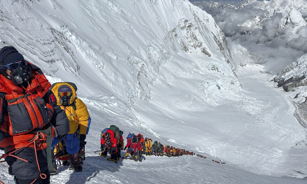 globaltimes.cn - Jiang Li - Chinese real estate entrepreneur wins Korean literary award, 'atypical writer' turns Everest experiences into literature