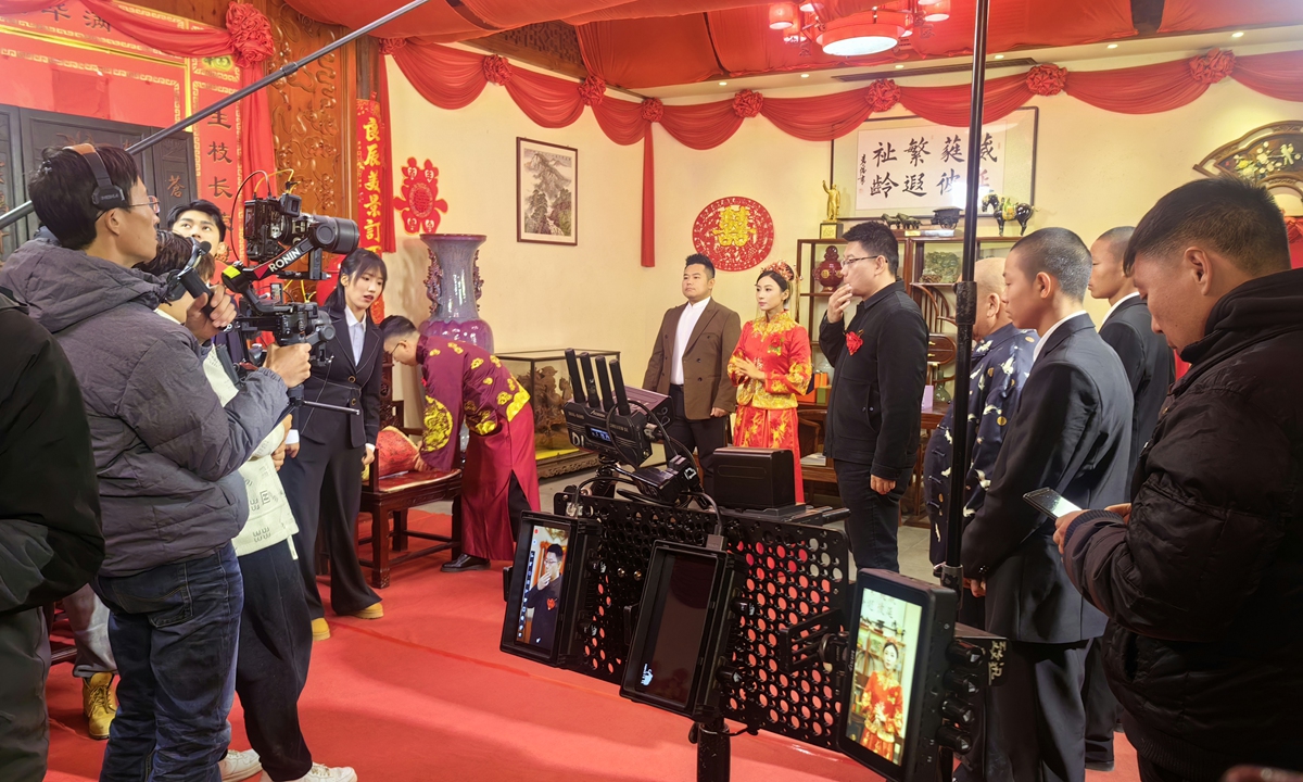 A short drama crew films a wedding-themed scene at a traditional residence in Yuanqiao village. Photo: Courtesy of Yuanqiao village