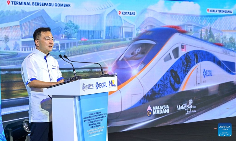 Zhang Bingnan, Executive Director and President of China Communications Construction Company (CCCC), speaks during a launch ceremony held at the Gombak station of the East Coast Rail Link (ECRL) in Selangor state, Malaysia, Aug. 14, 2026. The East Coast Rail Link (ECRL), a mega rail project in Malaysia being built by the China Communications Construction Company (CCCC), is expected to begin commercial operations by January 2027, Transport Minister Anthony Loke Siew Fook said on Friday.
In the meantime, the railway has reached 95.08 percent overall progress and has entered its testing and commissioning phase, keeping with its project schedule, Loke said in his speech at the launch ceremony of the ECRL Comprehensive Inspection Train (CIT). Photo: Xinhua