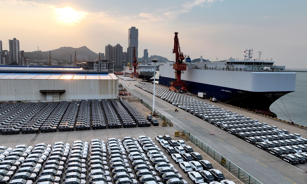 A ro-ro vessel loads domestically manufactured vehicles for shipment to Brazil at the terminal of Lianyungang Port, East China's Jiangsu Province on August 16, 2026. The port has opened 18 automobile ro-ro shipping routes, with a network covering more than 30 ports worldwide, including Europe, the Middle East, and Southeast Asia. Photo: VCG