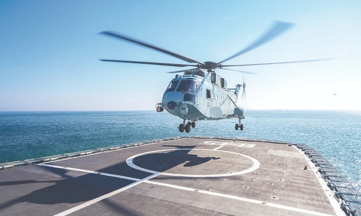One of the Chinese People's Liberation Army (PLA) Navy's first-batch female shipborne flight cadets completes her daytime shipborne landing qualification assessment. Photo: China Military Online