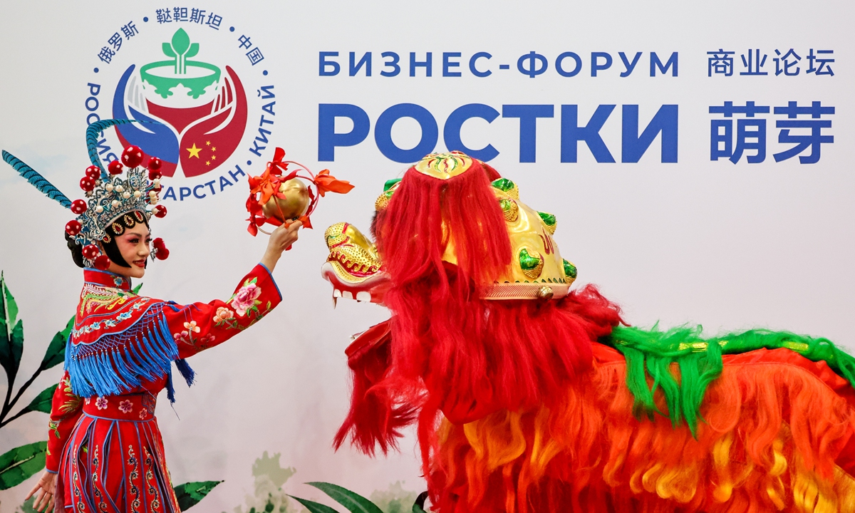 Chinese performers perform at the 2026 Russia-China Business Forum titled 