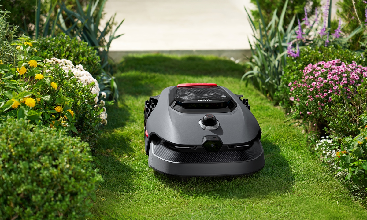 A MOVA robotic lawn mower operates on a lawn. Photo: Courtesy of NexLawn Intelligent Technology