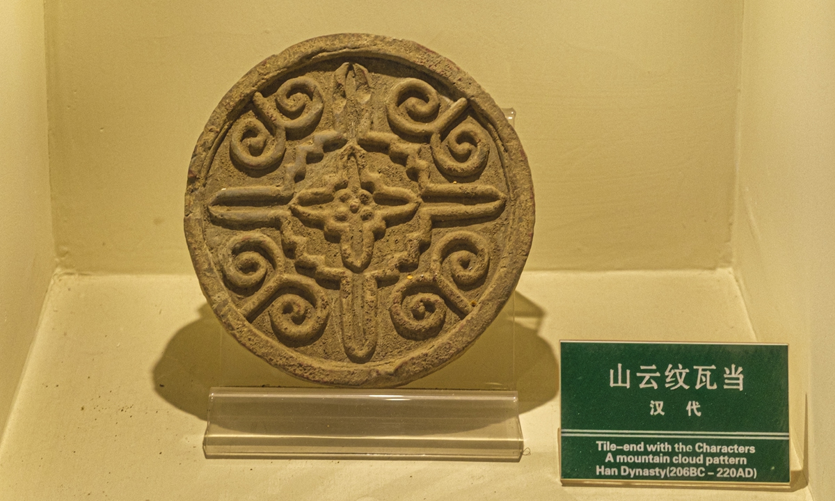 A Han Dynasty (206BC-AD220) tile?end with mountain?cloud patterns Photo: VCG