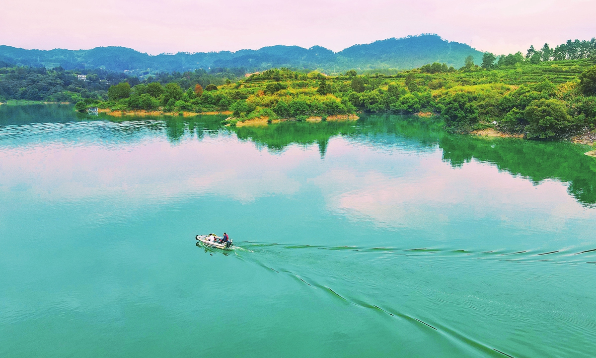 Staff members patrol Tiantang Lake by boat to safeguard the aquatic ecological environment in Anqing, East China's Anhui Province, on August 16, 2026. Photo: VCG