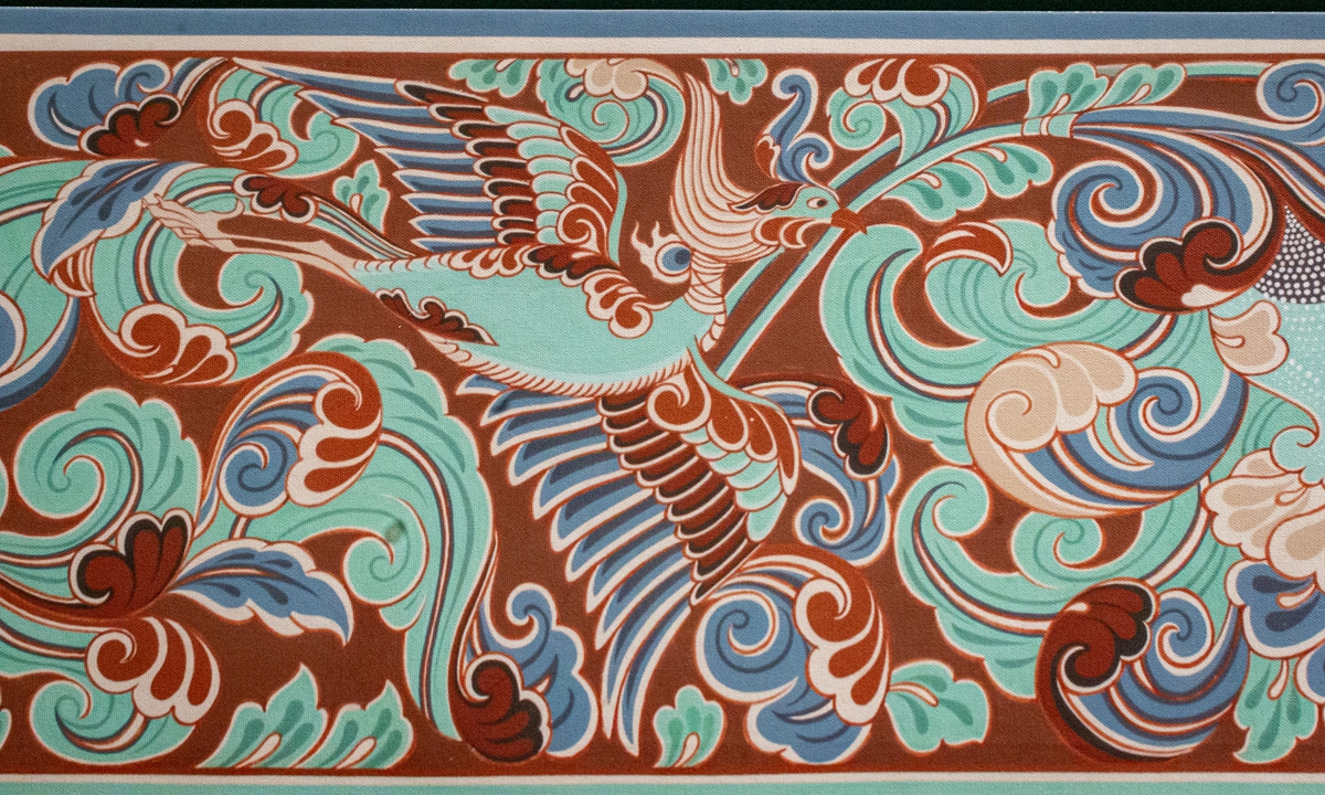 Part of a Tang Dynasty (618-907) interlocking floral scroll with phoenix motifs in the Mogao Grottoes