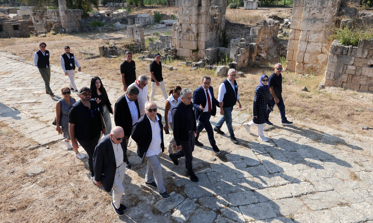 Lebanese Culture Minister Ghassan Salame and UNESCO Director General Khaled El-Enany during their visit to the al-Bass ruins district in Tyre, southern Lebanon, on August 20, 2026. Israeli air strikes have hit areas in the ruins district and near the ancient Roman hippodrome during the conflict between Israel and Hezbollah. Photo: VCG