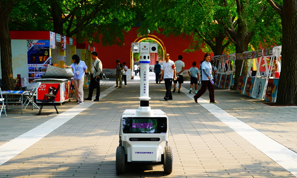 A smart inspection gardening robot operates inside Zhongshan Park in Beijing on August 20, 2026. As the development of smart parks advances, both park management models and visitor services are undergoing a new transformation. The robot application promotion program across municipal parks in the capital city has been fully launched. Photo: VCG