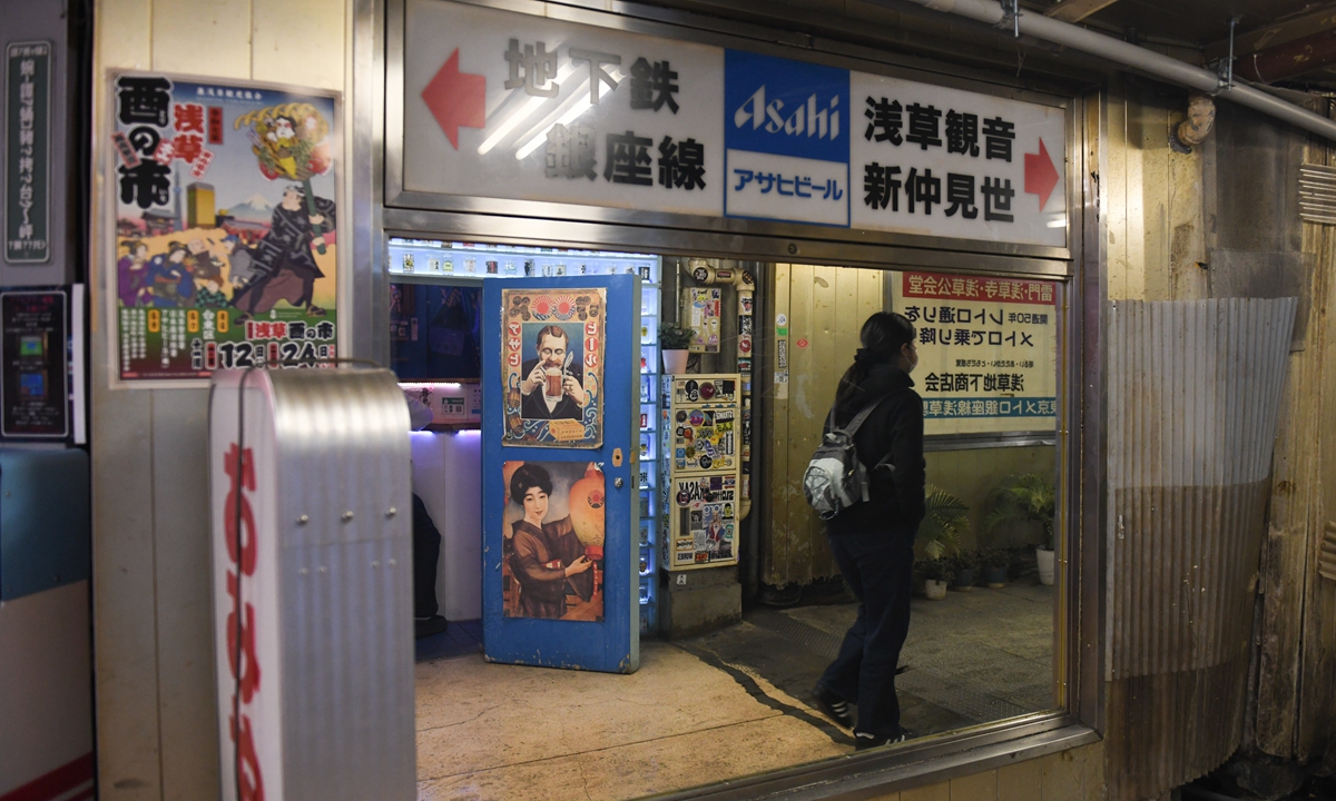 A pedestrian in the underground shopping center in the Asakusa district in Tokyo, Japan, on November 16, 2025. Photo: VCG