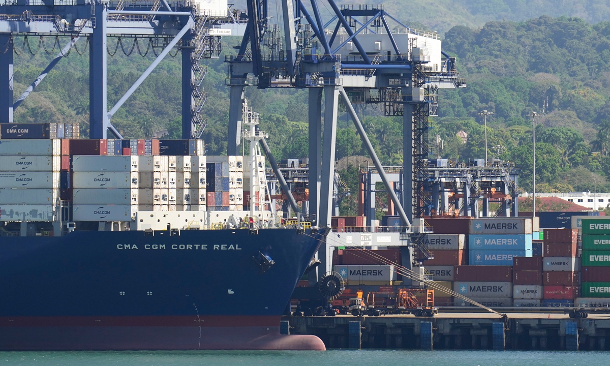 Cranes load a cargo ship at Panama Canal's Port of Balboa, managed by CK Hutchison Holdings, in Panama City, on January 30, 2026. Photo: VCG