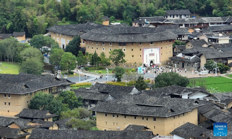 A drone photo taken on Aug. 20, 2026 shows a view of the Huaiyuan Tulou at the Yunshuiyao scenic spot, an ancient village known for its well-preserved Tulou compounds, in Nanjing County of Zhangzhou City, southeast China's Fujian Province. In recent years, Nanjing County has been revitalizing its historical Tulou compounds and Hakka heritage by integrating culture and tourism, upgrading tourist attractions and introducing immersive experiences to draw more visitors. (Xinhua/Lin Shanchuan)