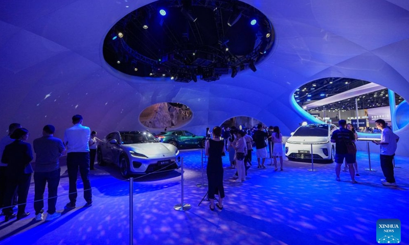 People visit the Harmony Intelligent Mobility Alliance (HIMA) exhibition area at the Chengdu Motor Show 2026 in Chengdu, southwest China's Sichuan Province, Aug. 21, 2026. The Chengdu Motor Show 2026 kicked off at Western China International Expo City in Chengdu on Friday. The show features around 1,600 vehicles from nearly 120 domestic and international brands and runs until Aug. 30. (Xinhua/Xu Bingjie)