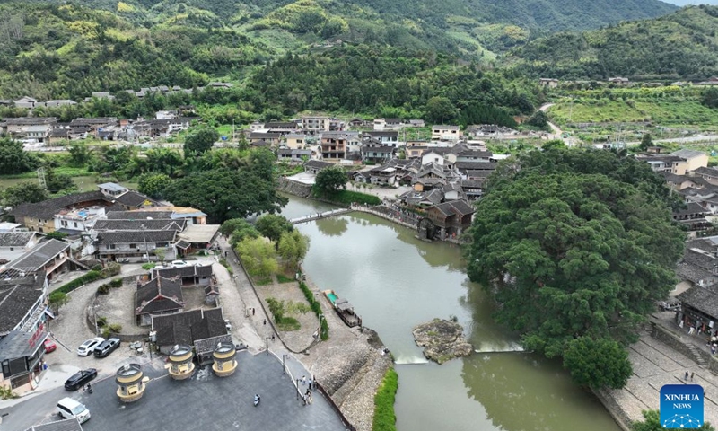 An aerial drone photo taken on Aug. 20, 2026 shows a view of the Yunshuiyao scenic spot, an ancient village known for its well-preserved Tulou compounds, in Nanjing County of Zhangzhou City, southeast China's Fujian Province. In recent years, Nanjing County has been revitalizing its historical Tulou compounds and Hakka heritage by integrating culture and tourism, upgrading tourist attractions and introducing immersive experiences to draw more visitors. (Xinhua/Lin Shanchuan)