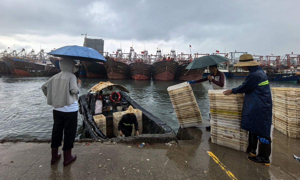 Fishermen in South China’s Guangxi Zhuang Autonomous Region return to port to shelter from the typhoon on August 21, 2026. Photo: VCG