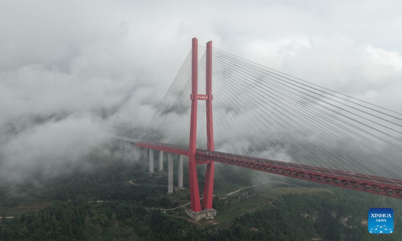 An aerial drone photo taken on Aug. 15, 2026 shows the Yachi River Bridge in the mist in southwest China's Guizhou Province. With a main span of 800 meters and a total length of 1,450 meters, the bridge serves as a key link connecting Bijie City and Guiyang City in southwest China's Guizhou Province. Photo: Xinhua