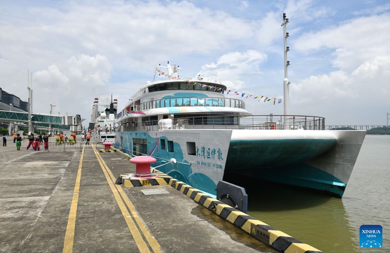 The cruise ship Da Wan Qu Yi Dun docks at the Nansha International Cruise Home Port in Guangzhou, south China's Guangdong Province, Aug. 22, 2026. Named after the Greater Bay Area, known in Chinese as Da Wan Qu, the cruise ship Da Wan Qu Yi Dun departed from the Nansha International Cruise Home Port in Guangzhou on Saturday, marking the official launch of the regular Guangzhou-Shenzhen maritime cultural tourism route.
Sailing past the Hong Kong-Zhuhai-Macao Bridge, the Shenzhen-Zhongshan Link and 16 landmarks of the Greater Bay Area, the ship also provided visitors with diverse onboard experiences including performances themed on intangible cultural heritage and magic shows. Photo: Xinhua