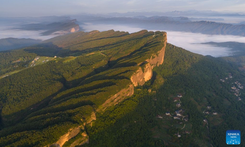 A drone photo taken on Aug. 20, 2026 shows a view of Xiaojian Mountain at sunrise in Jian'ge County, Guangyuan City of southwest China's Sichuan Province. (Xinhua/Jiang Hongjing)