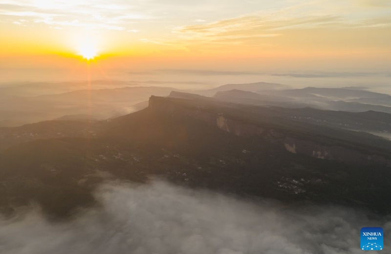 A drone photo taken on Aug. 20, 2026 shows a view of Dajian Mountain at sunrise in Jian'ge County, Guangyuan City of southwest China's Sichuan Province. (Xinhua/Jiang Hongjing)