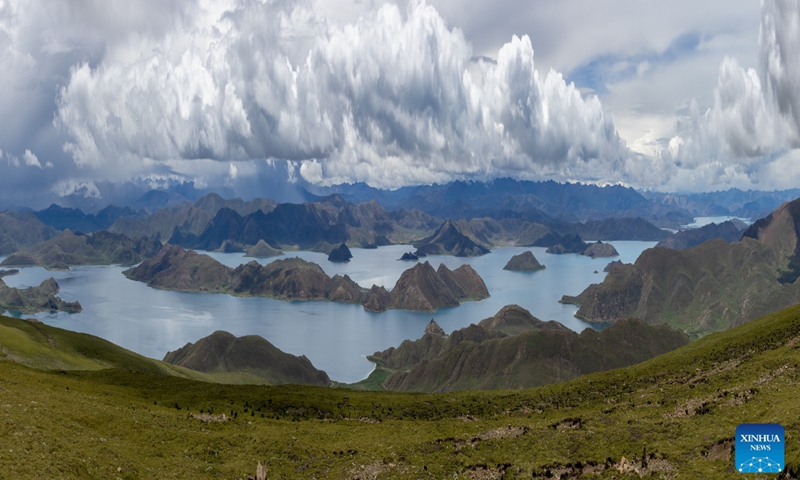 This stitched panorama photo taken on Aug. 20, 2026 shows Lake Yamzhog Yumco, Shannan City, southwest China's Xizang Autonomous Region. (Xinhua/Jiang Fan)