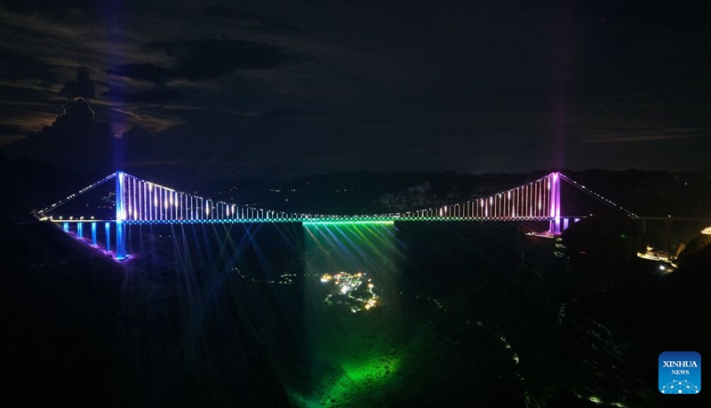An aerial drone photo taken on July 30, 2026 shows a night view of the Huajiang Grand Canyon Bridge in southwest China's Guizhou Province. The bridge, soaring 625 meters above the Beipan River in Guizhou's mountainous terrain, is the world's highest bridge. It opened to traffic on Sept. 28, 2025. Photo: Xinhua