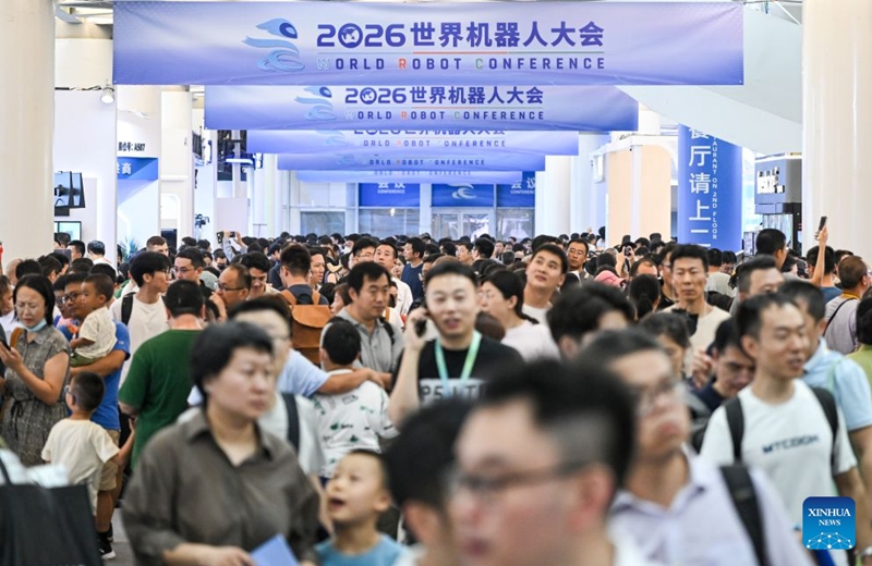 People visit the 2026 World Robot Conference in Beijing, capital of China, Aug. 22, 2026. The conference, which runs from Wednesday through Sunday, has drawn more than 300 exhibitors from 26 countries, with over 3,000 products on display, including more than 300 debuts. Many people visited the conference on Saturday, the first open day of the event. Photo: Xinhua