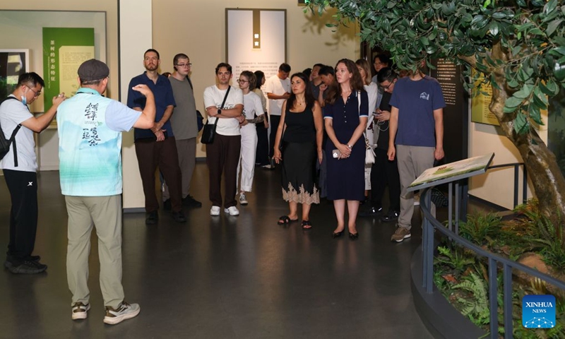 Members of a joint China-Russia media delegation visit the China National Tea Museum in Hangzhou, east China's Zhejiang Province, Aug. 20, 2026. The delegation visited Hangzhou from Aug. 20 to 22, experiencing the charm of Chinese culture. (Xinhua/Jiang Han)